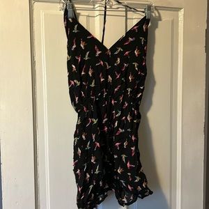 Black lace up back romper with colorful birds